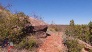 The trail as it skirts by a boulder (photo courtesy of A. McGowen)